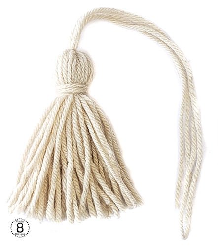 Cream colored yarn tassel