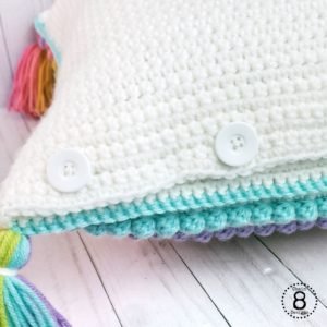 Up-close picture of the back cover of the bobble stitch striped pillow