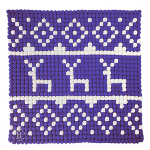 Purple and white crochet reindeer pillow front